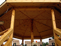 This gazebo was constructed with ponderosa pine hand-peeled D logs and ponderosa paneling on the ceiling